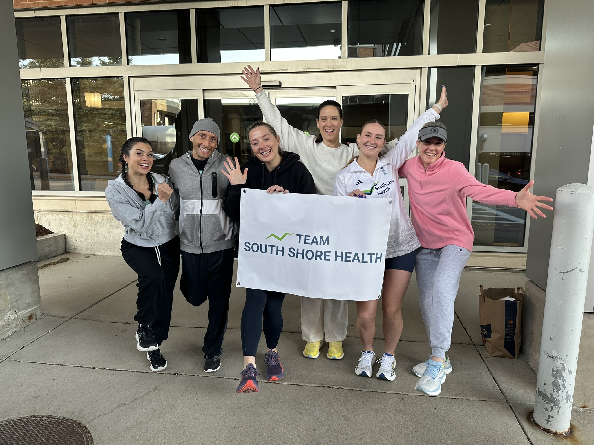 Group photo of Team South Shore Health prior to the 2025 Boston Marathon
