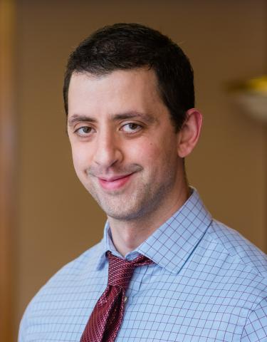 Headshot of Christopher Coughlin, CNP