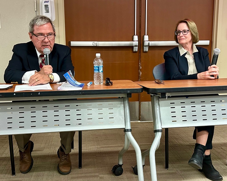 Dr. Michael Hession at the microphone speaking