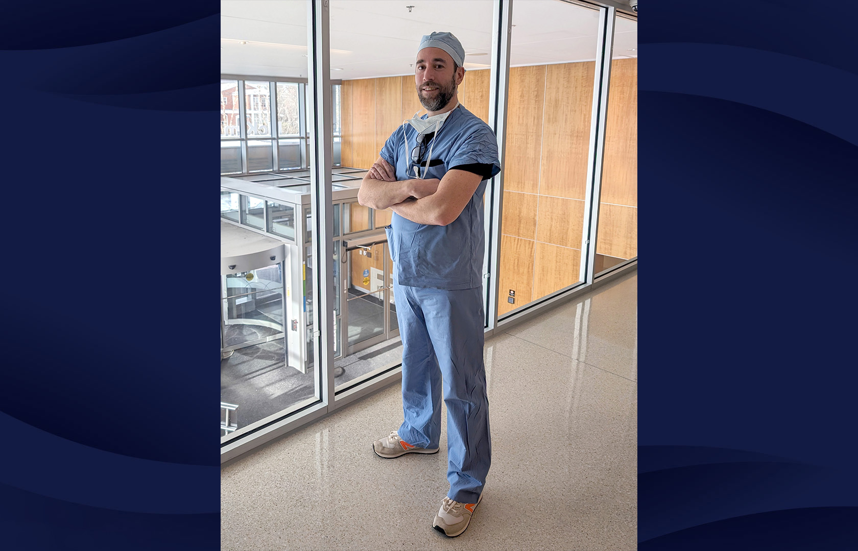 John Photos, CRNA stands with his arms crossed for a photo at South Shore Hospital.