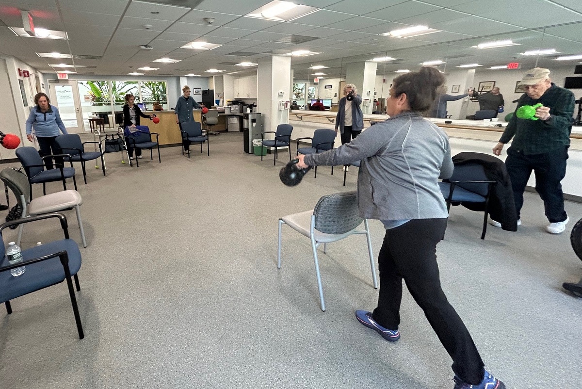 Jennifer Logan leads a senior strength training exercise class