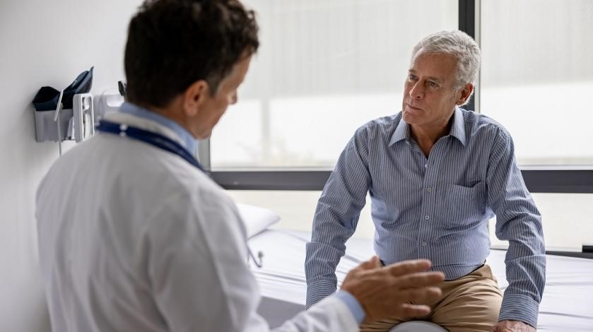 An older male patient consults with his physician