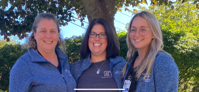 Three colleagues from South Shore Hospital's Pulmonary Rehab Team pose for a photo after receiving a program certification.