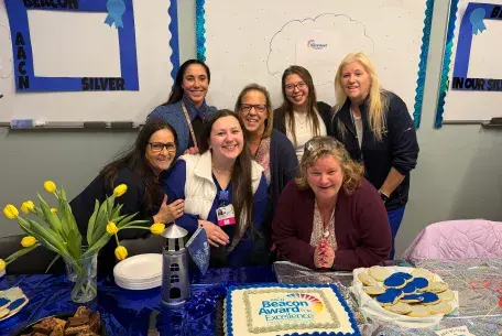Colleagues from South Shore Health's CCU gathered in celebration of their recent Beacon Silver recognition.