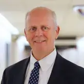 Professional headshot of Gordon Huggins, MD of South Shore Health