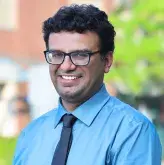 Professional headshot of Aftab Iqbal, MD of South Shore Medical Center