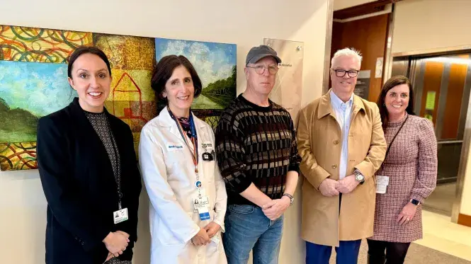 Colleagues from South Shore Health pose with members of the Kennefick family