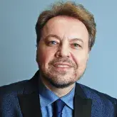 Dr. George Kroumpouzosg