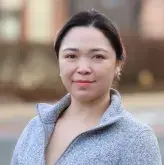 Professional headshot of Tho Le of South Shore Health